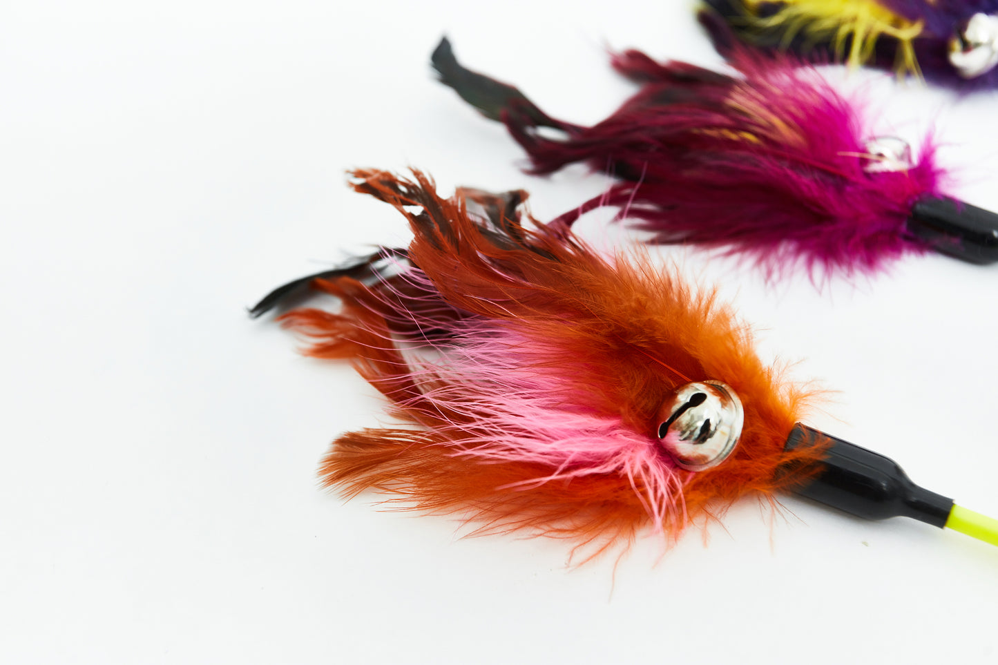 Feather rod with bell